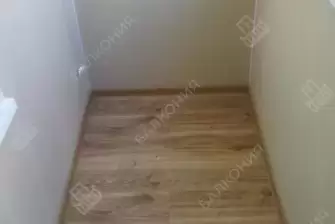 Остекление балкона с отделкой в многоквартирном доме