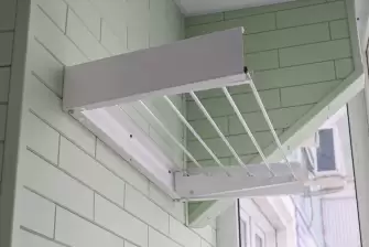 Отделка стеновым паркетом Г-образного балкона с утеплением