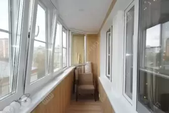 Остекление лоджии окнами с мультифункциональным стеклопакетом и отделка